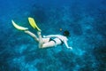 Woman with mask snorkeling