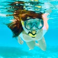 Woman with mask snorkeling