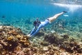 Woman with mask snorkeling