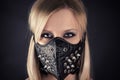 Woman in a mask with spikes Royalty Free Stock Photo