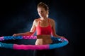 Woman with massage hula hoop Royalty Free Stock Photo