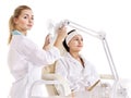 Woman on massage table in beauty spa. Royalty Free Stock Photo