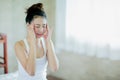 Woman massages herself for relieve headache Royalty Free Stock Photo