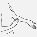 Woman massaging her left arm