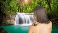 Woman massaging with Obsidian stone Royalty Free Stock Photo