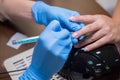 Woman master manicure. Girl does manicure in a beauty salon