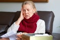 Woman Mature Taking Medicine. Woman Holding Blister Pack With Pills In Hand And Reading Medical Instructions. Royalty Free Stock Photo