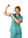 Woman md emergency doctor or nurse posing smiling cheerful with stethoscope showing biceps Royalty Free Stock Photo