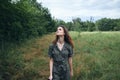 Woman in the meadow Looking up the fresh air is nature delight