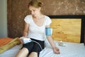 Woman measuring blood pressure at home. Device for blood pressure. poor health. To be sick in bed.