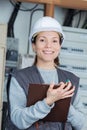 Woman measuring electrical current Royalty Free Stock Photo