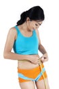 Woman Measuring Her Waist Royalty Free Stock Photo