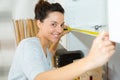 woman measuring with measure tape Royalty Free Stock Photo
