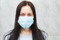 Quarantined woman in medical mask