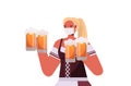 Woman in medical mask holding beer mugs Oktoberfest party celebration coronavirus quarantine concept Royalty Free Stock Photo