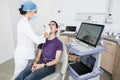 Dentist scanning teeth of patient