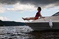 Woman meditate on bow of cutter