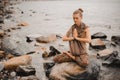 Woman meditating at the beach . yoga retreat. namaste in lotus pose Royalty Free Stock Photo