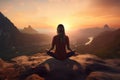 Woman meditating in the desert at sunset. The concept of meditation and relaxation, Female meditating on top of a mountain with Royalty Free Stock Photo