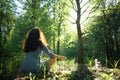 Woman meditating in forest Royalty Free Stock Photo