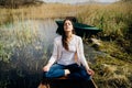 Woman meditating in nature.Escape from stressful reality.Mindful woman practicing meditation.Breathing technique.Mental state