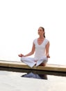 Woman meditating near the sea Royalty Free Stock Photo