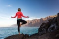 Woman meditating in yoga vrksasana tree pose Royalty Free Stock Photo