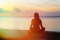 Woman meditation on the beach