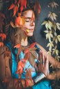 Woman in meditation behind leaves