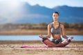 Woman, meditation and mat in outdoor for yoga practice, wellness and healthy recreation activity in tranquil environment Royalty Free Stock Photo