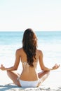 Woman, meditation and zen on beach for spiritual wellness, awareness or yoga in nature. Rear view of female person or Royalty Free Stock Photo