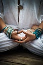 Woman in a meditative yoga position lower body Royalty Free Stock Photo