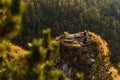 A woman meets the sunset in the mountains. Man travels in the mountains. Mountain tourism. The journey to the mountains. Royalty Free Stock Photo