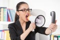 Woman with megaphone. Royalty Free Stock Photo