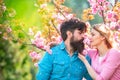 Woman and man enjoying perfect relationships and spending sprinf vacations. Romantic portrait of a sensual couple in Royalty Free Stock Photo