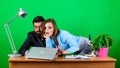 Woman and man work in office at laptop. secretary with boss at workplace. business couple at computer. businessman and Royalty Free Stock Photo