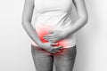 Woman with menstrual pain is holding her aching belly Royalty Free Stock Photo