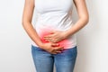 Woman with menstrual pain is holding her aching belly Royalty Free Stock Photo
