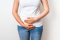 Woman with menstrual pain is holding her aching belly Royalty Free Stock Photo