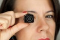 Woman with mini photocamera Royalty Free Stock Photo