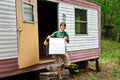 Woman at a Mobile Home Royalty Free Stock Photo