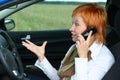 Woman with mobilein a car. Royalty Free Stock Photo