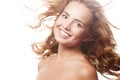 Woman model with windswept flying hair. Royalty Free Stock Photo