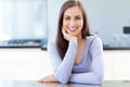 Woman in modern kitchen Royalty Free Stock Photo