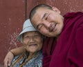 Woman and Monk in Buddhist Temple Mongolia Royalty Free Stock Photo