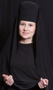 Woman in a monk robe. Royalty Free Stock Photo