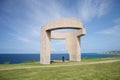 Woman at monument in Gijon