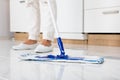 Woman Mopping The Floor In Kitchen Royalty Free Stock Photo