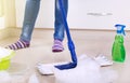 Woman mopping kitchen floor Royalty Free Stock Photo