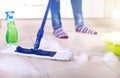 Woman mopping kitchen floor Royalty Free Stock Photo